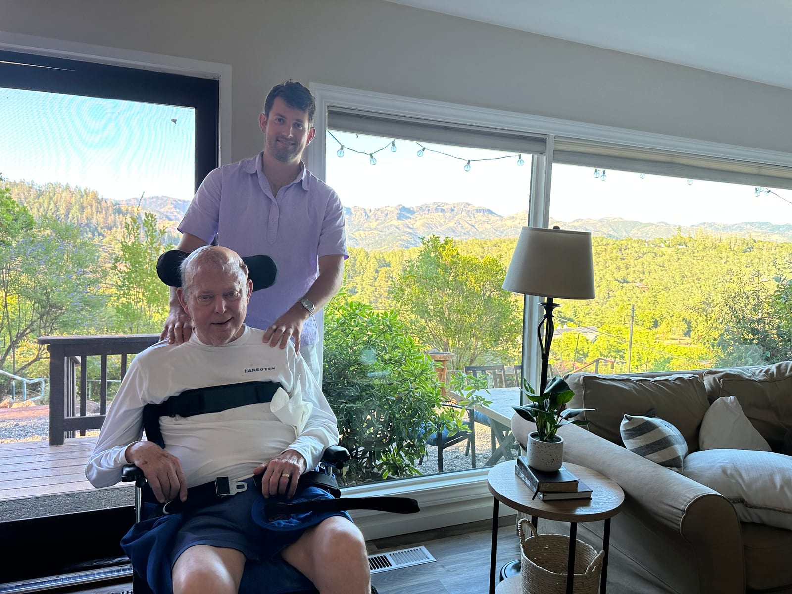 John with his dad by the window, the Santa Rosa hills beyond